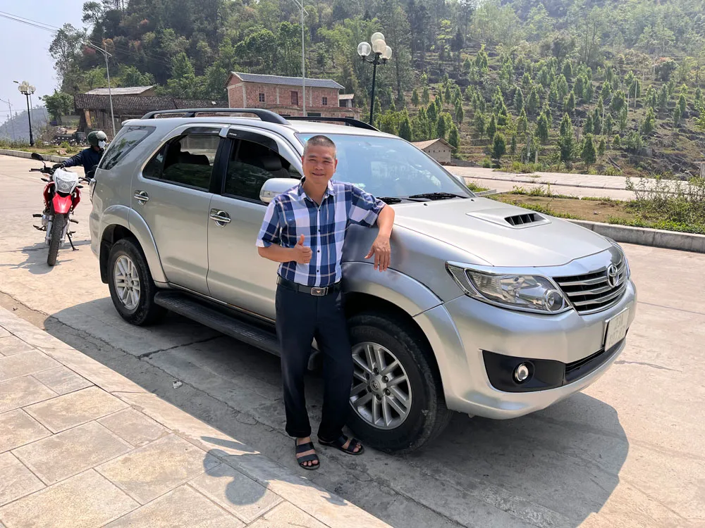 A private driver with a Toyota Fortuner, used for Ha Giang tours in northern Vietnam